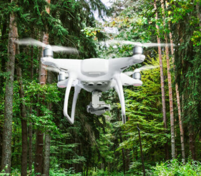 MoPho-18083915-hovering-drone-taking-pictures-of-m-min